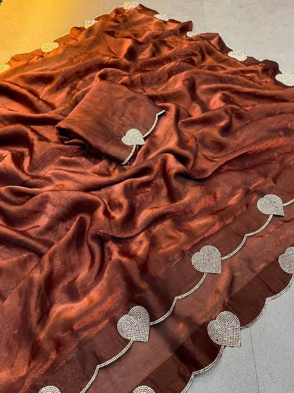 https://lyvstor.blr1.cdn.digitaloceanspaces.com/live/19im8Saree.webp